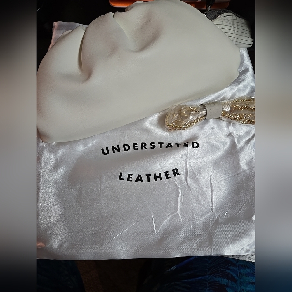 UNDERSTATED LEATHER Crescent White Clutch - Dust bag Included MSRP $165